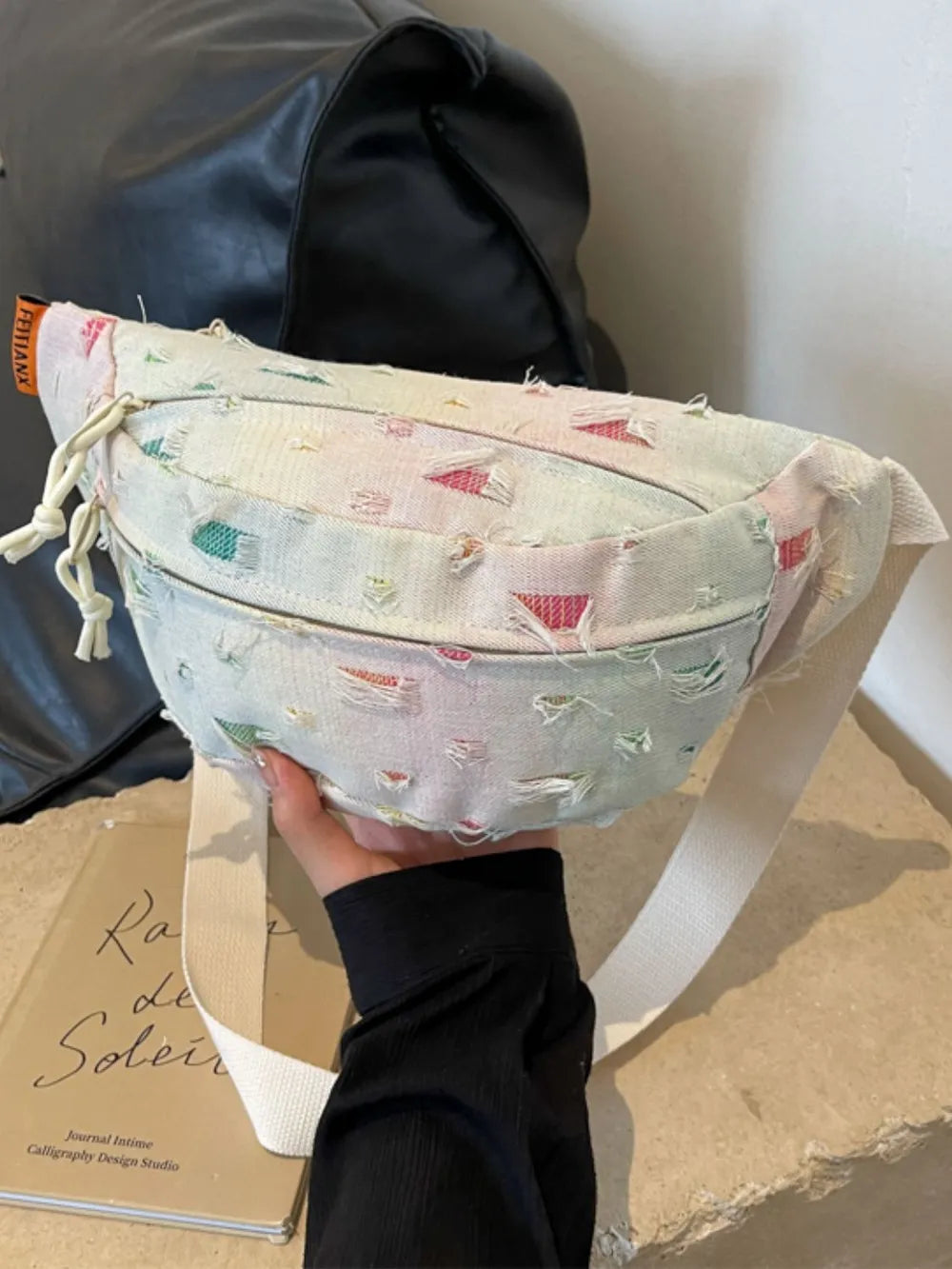 Raw hem vintage-style handbag