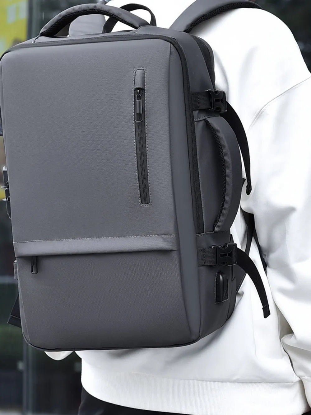 Woman carrying adjustable strap backpack