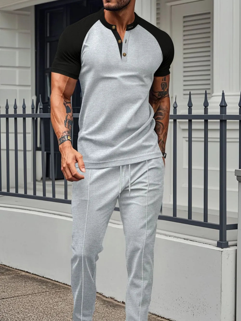 Man wearing plus size waffle-knit top and drawstring pants set