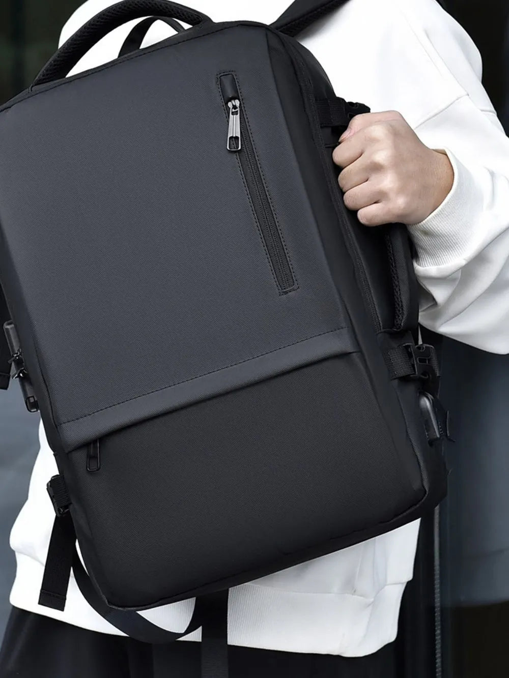 Black backpack with side pockets
