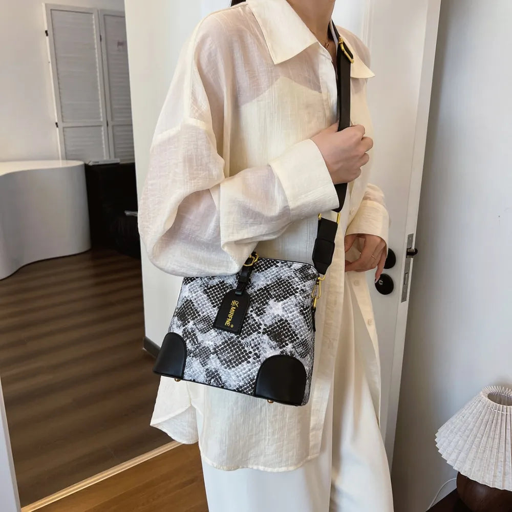 Faux snakeskin mini handbag