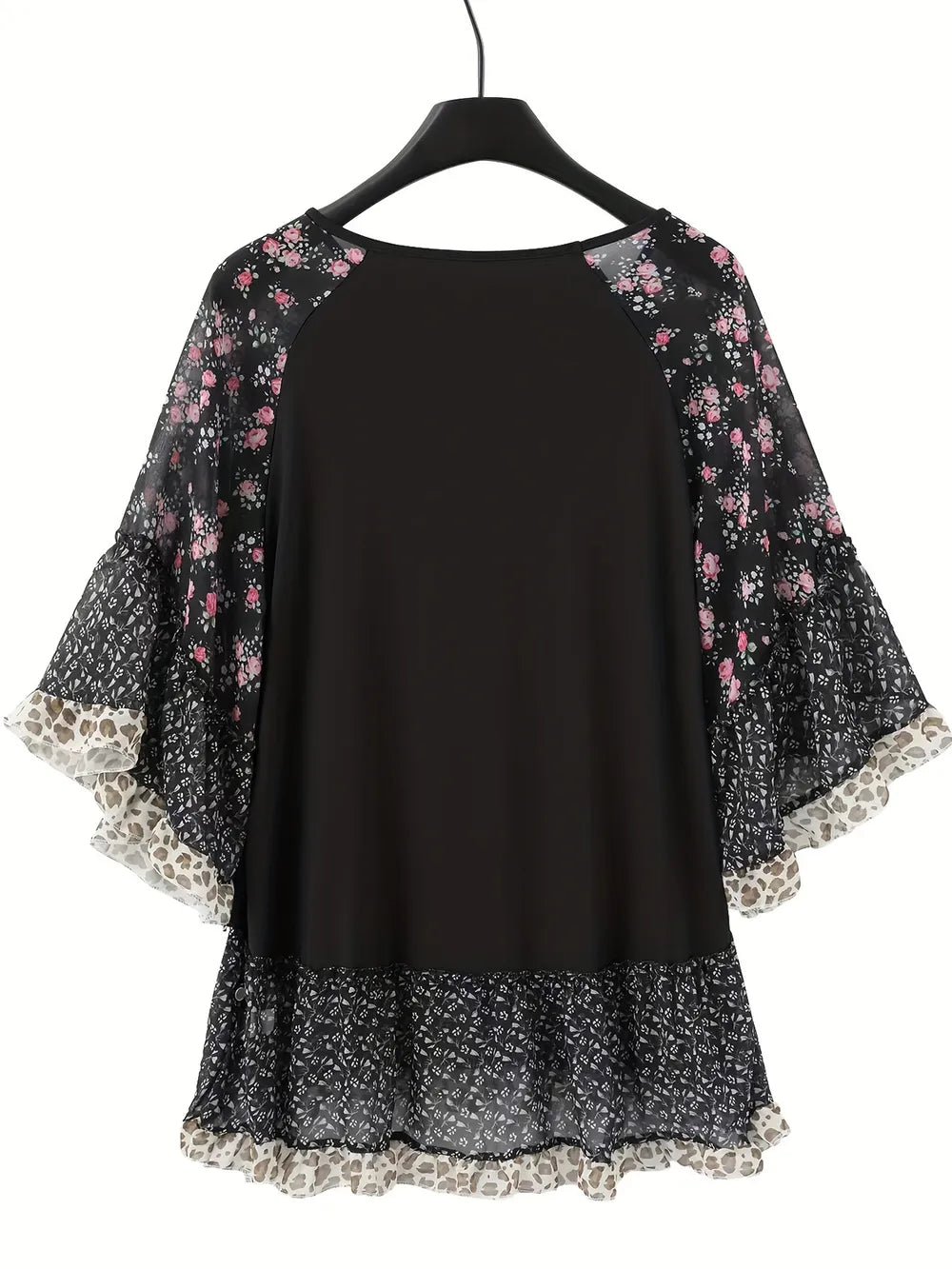 Plus size model showcasing blouse