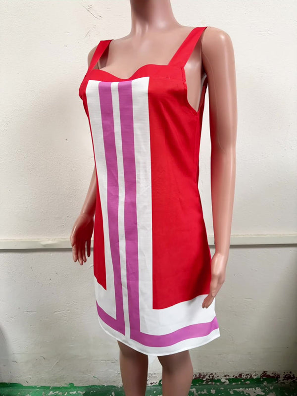 Red dress with white and pink stripes on a mannequin against a plain background