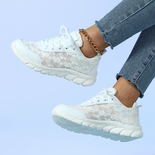 White breathable women’s running shoes

