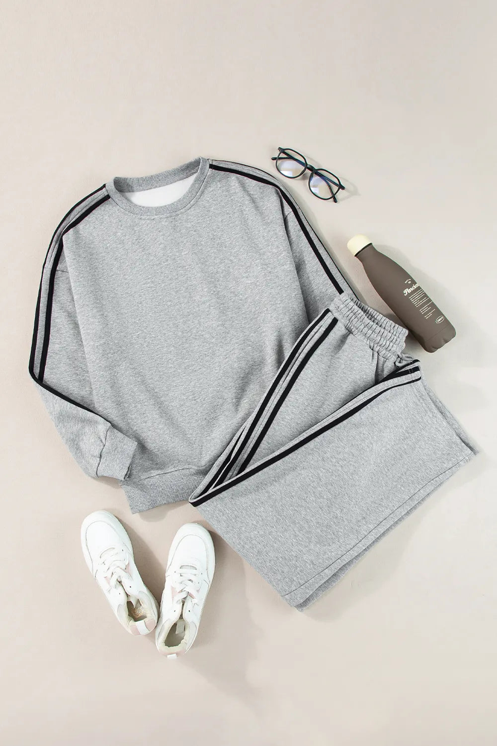 Casual sporty look with a round neck top and jogger-style pants

