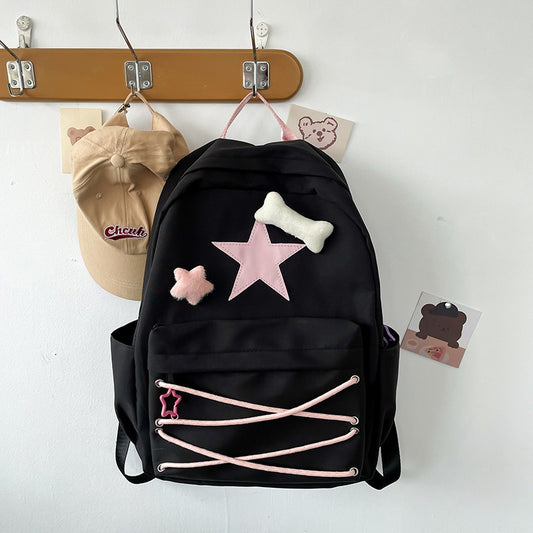 Lightweight school bag hanging on wall hook

