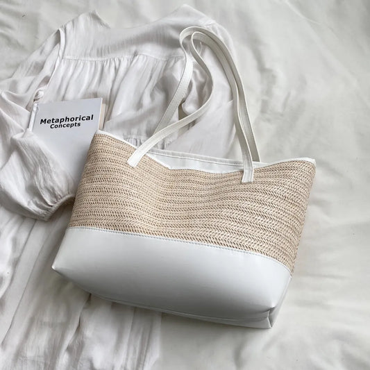 Straw tote bag with leather straps

