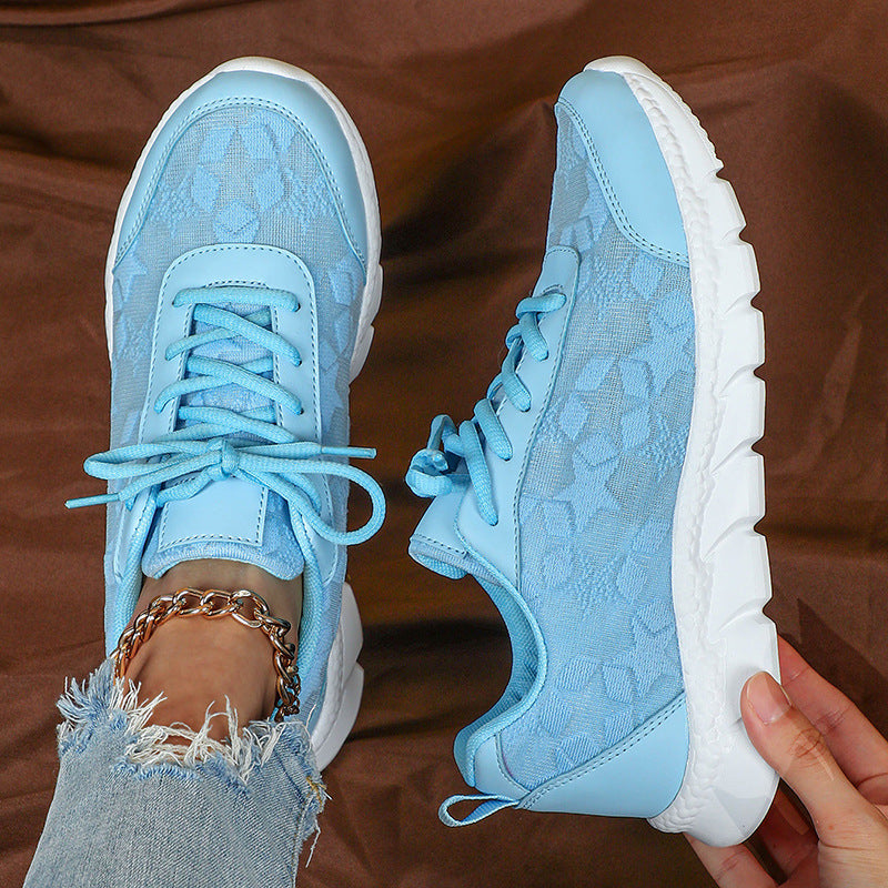 Lightweight white sports sneakers

