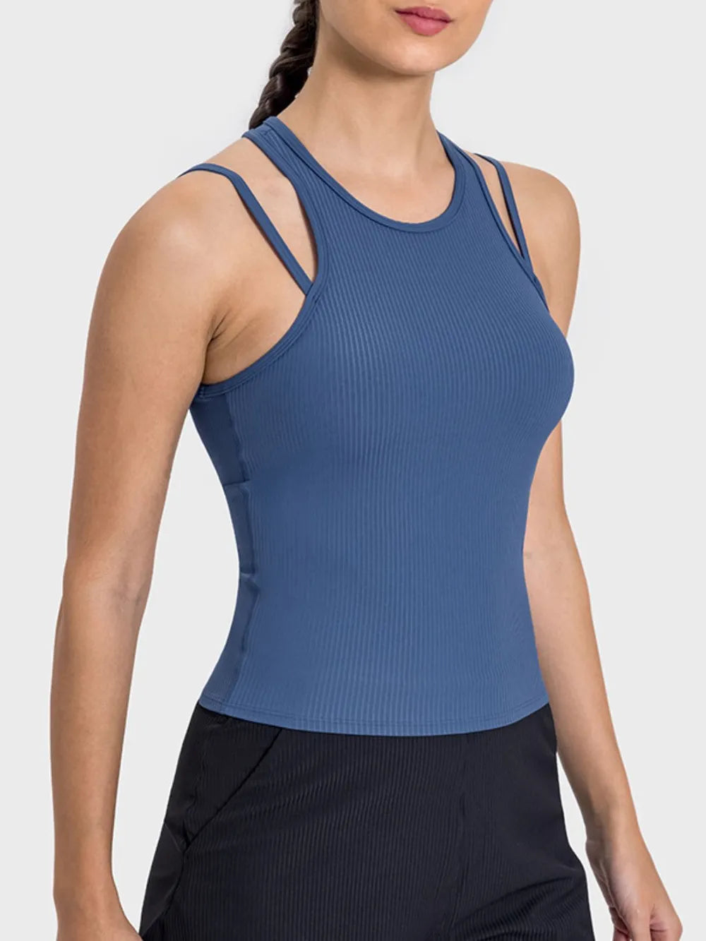 "Sleek earth-tone workout tank with double shoulder straps, ribbed texture, and slim fit design, styled with casual white bottoms."
RetryClaude can make mistakes. Please double-check responses.