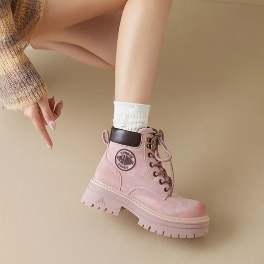 Side view of round toe platform lace-up boots

