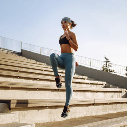 Woman using breathable headband during yoga

