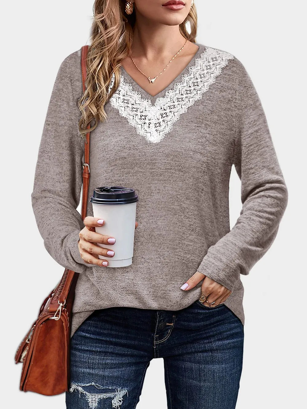 Solid color V-neck loose casual long sleeved T-shirt top for women's wear