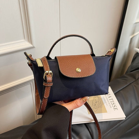 2025 women's mini dumpling handbag

