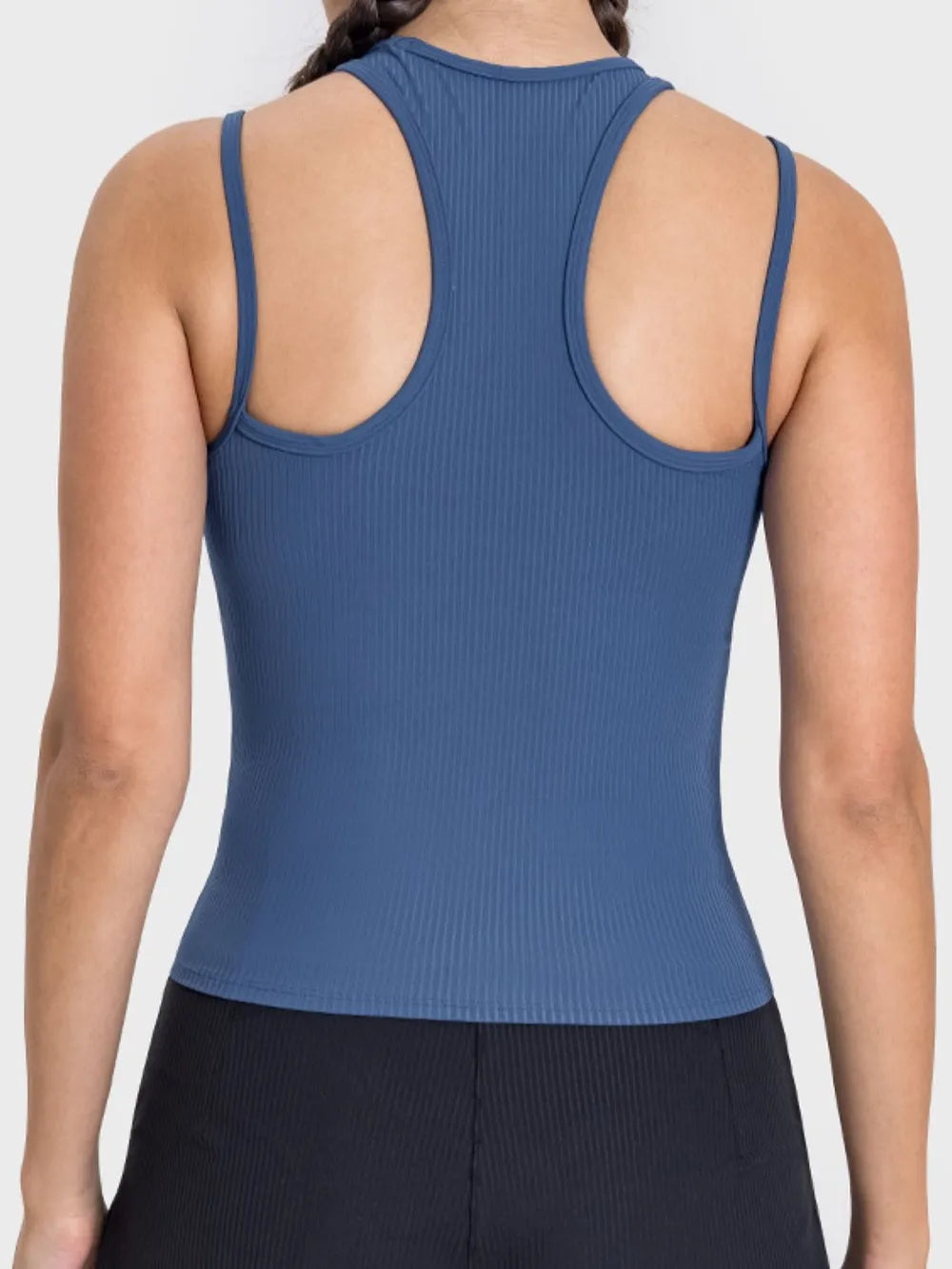 "Sleek earth-tone workout tank with double shoulder straps, ribbed texture, and slim fit design, styled with casual white bottoms."
RetryClaude can make mistakes. Please double-check responses.