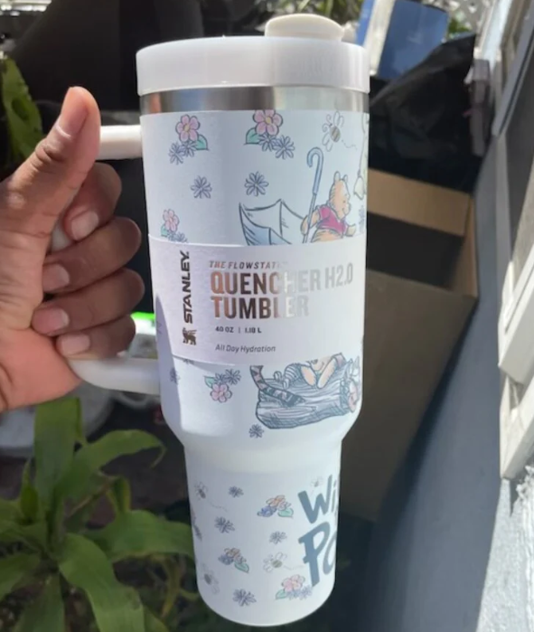  Stanley Winnie the Pooh Quencher Tumbler held in hand – front view