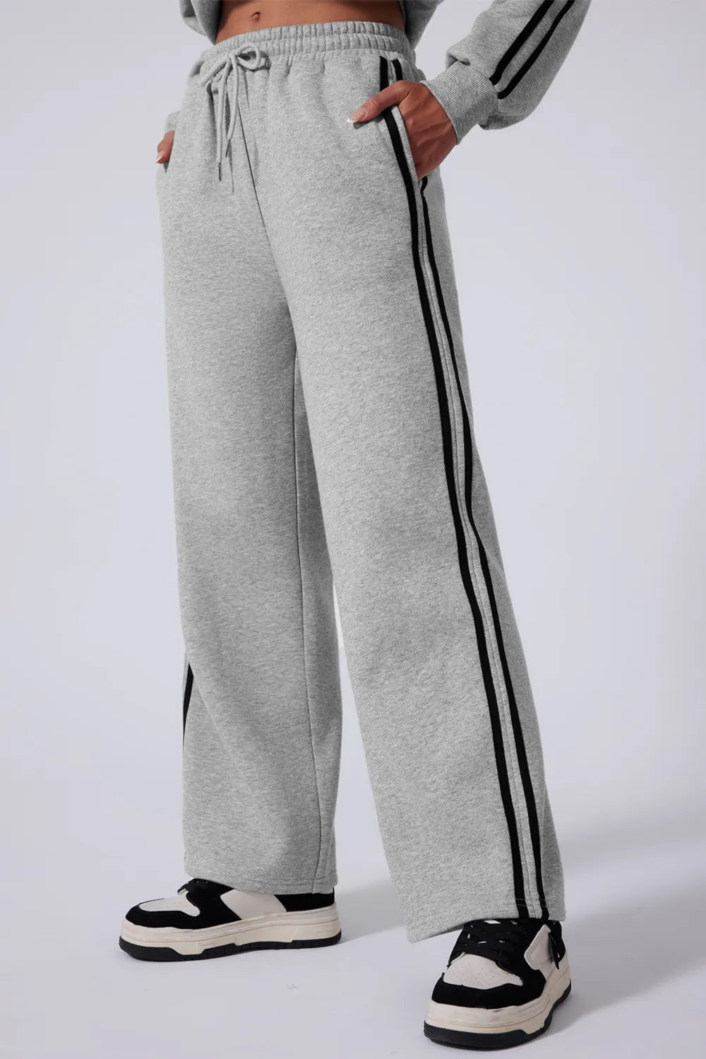 Side stripe detail on sleeve and pant leg

