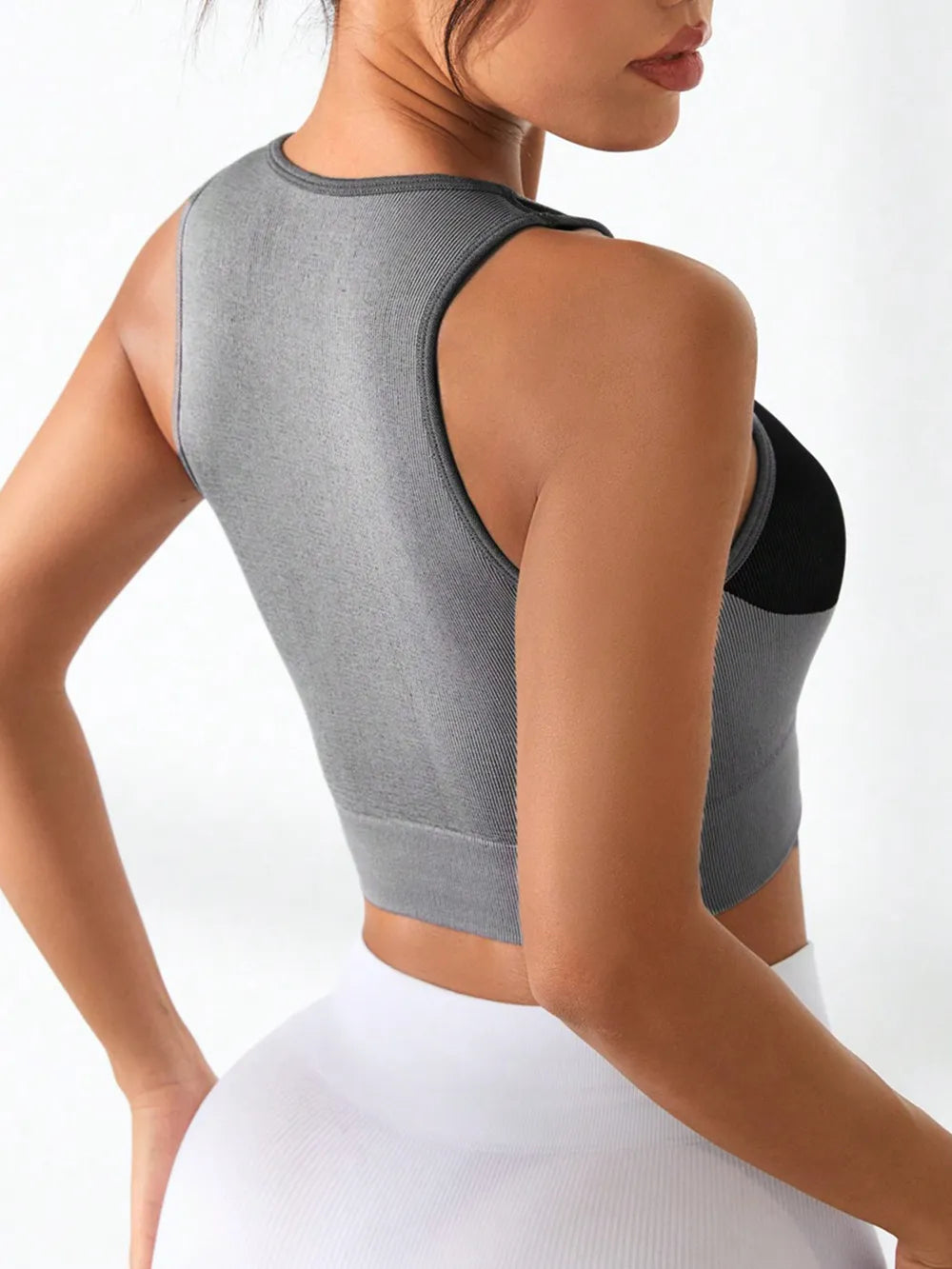 Side view of sporty tank top with color block design

