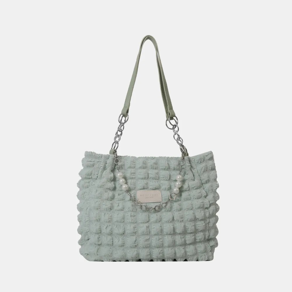 Front view of stylish tote handbag

