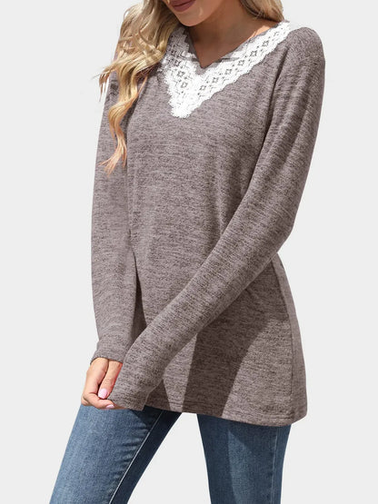 Solid color V-neck loose casual long sleeved T-shirt top for women's wear