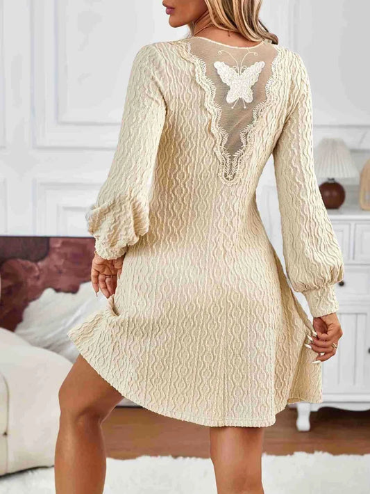 Front view of the lace detail V-neck dress

