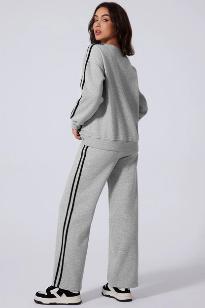 Front view of the full activewear set with white side stripes


