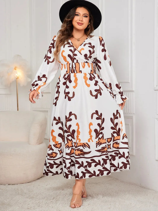 Front view of honey-toned plus size printed surplice dress
