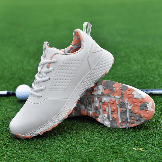 White and pink unisex golf shoes with rotating spikes by Mazify
