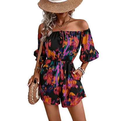 Front view of women's abstract print off-shoulder jumpsuit
