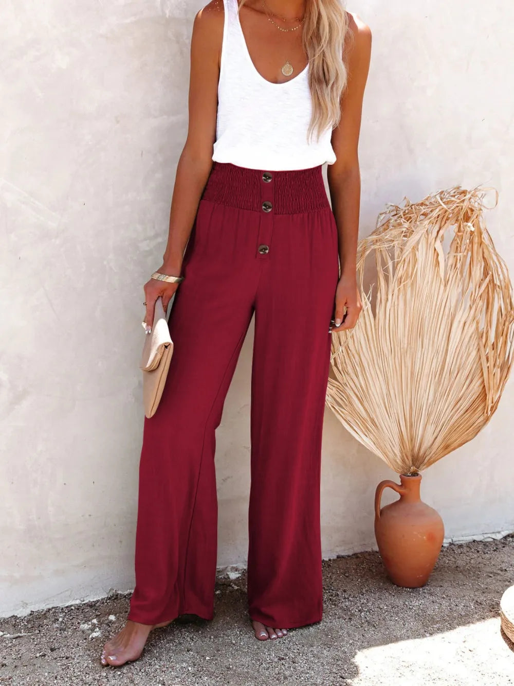 Side angle of full-size slimming pants with buttons
