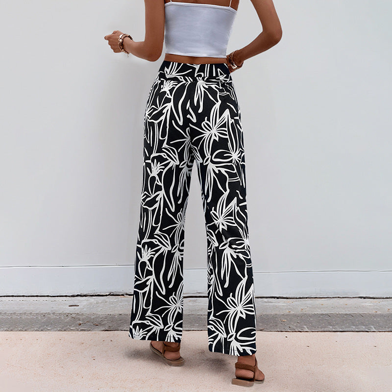 Vacation style wide leg pants with tropical design
