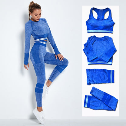 Women's blue 4-piece seamless yoga set including sports bra, long sleeve crop top, shorts and high waist leggings