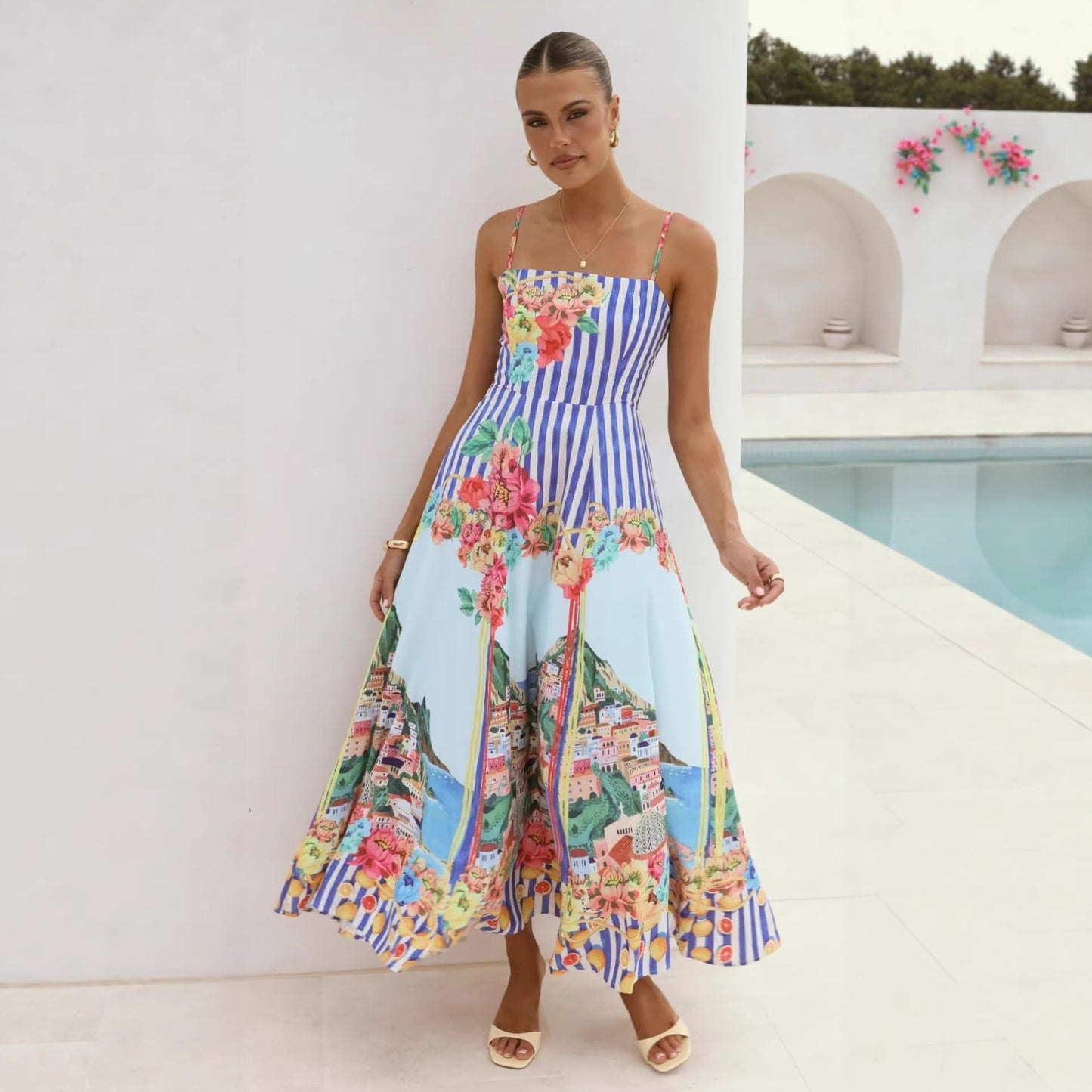 Women's blue stripe and Amalfi Coast scenic floral print spaghetti strap swing maxi dress