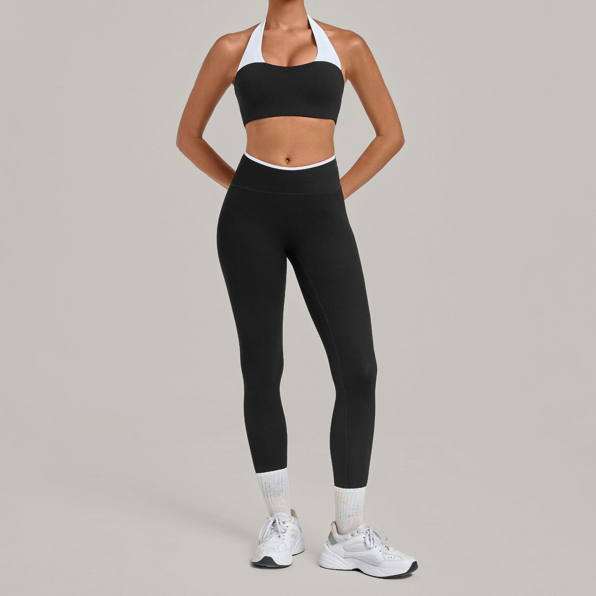 Women's black halter neck contrast white strap nude-feel sports bra and high waist leggings yoga set
