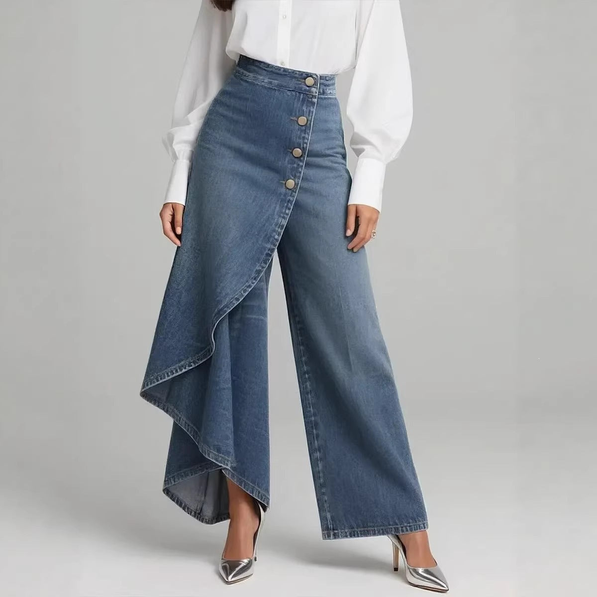 Women's high waist asymmetric ruffle hem wide leg denim jeans with button detail
