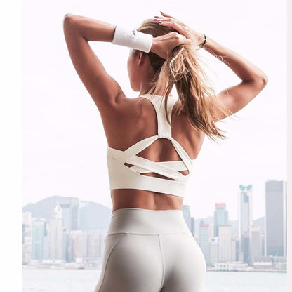 Women's white push-up cross back hollow-out sports bra back view showing strap detail