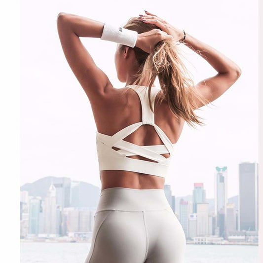 Women's white push-up cross back hollow-out sports bra back view showing strap detail