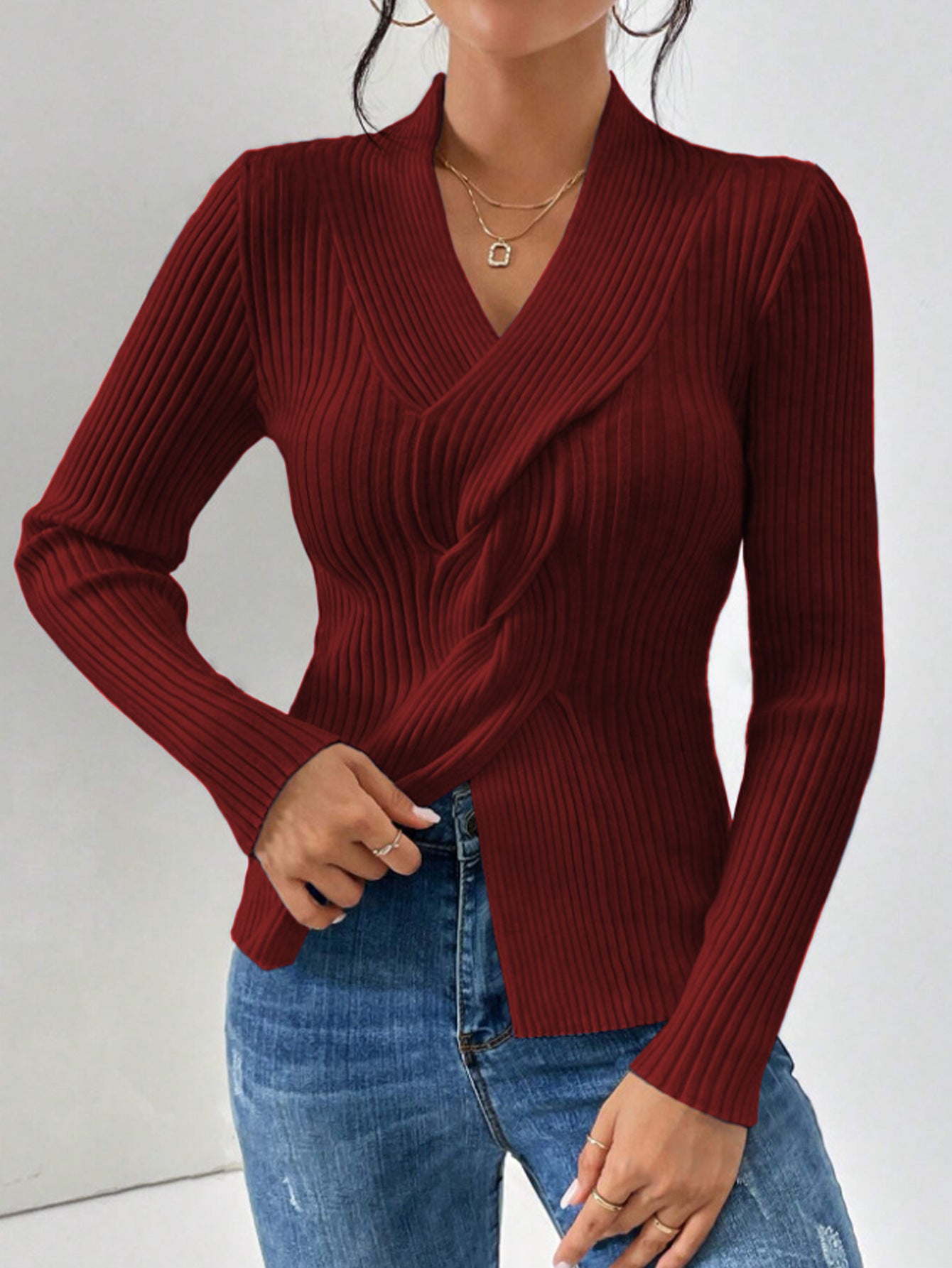 Women's burgundy ribbed knit twist front slim fit long sleeve pullover sweater