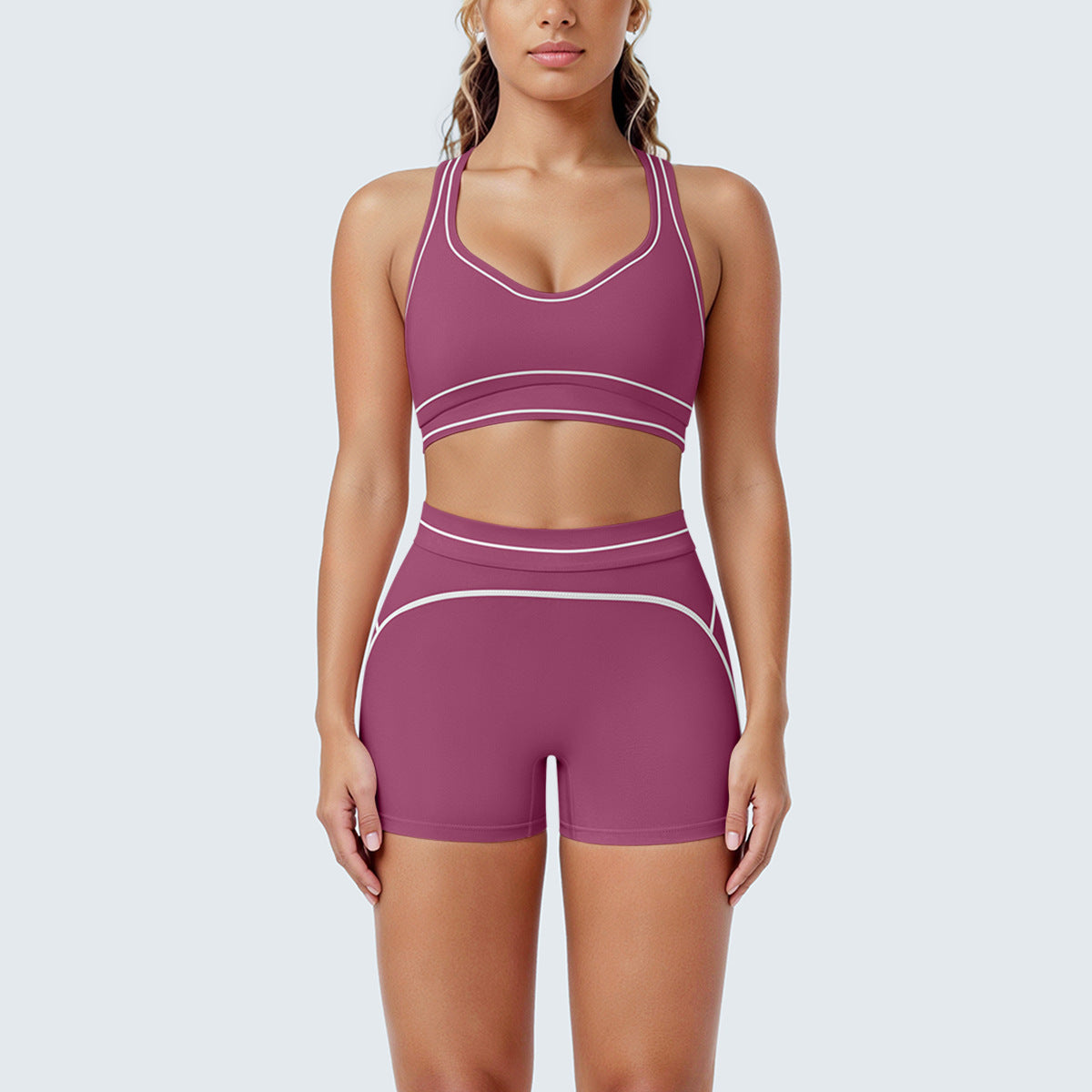 Women's pink shockproof push-up sports bra and high waist shorts yoga gym set