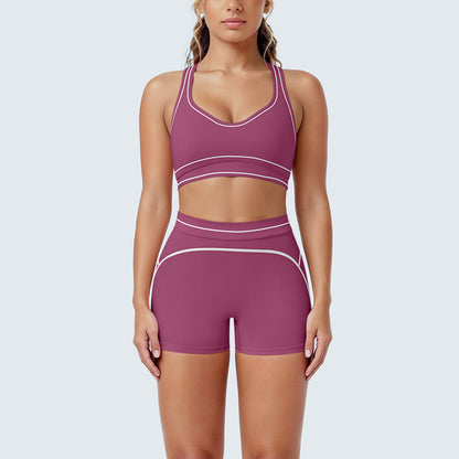 Women's pink shockproof push-up sports bra and high waist shorts yoga gym set