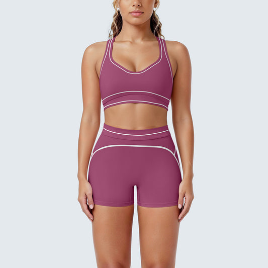 Women's pink shockproof push-up sports bra and high waist shorts yoga gym set